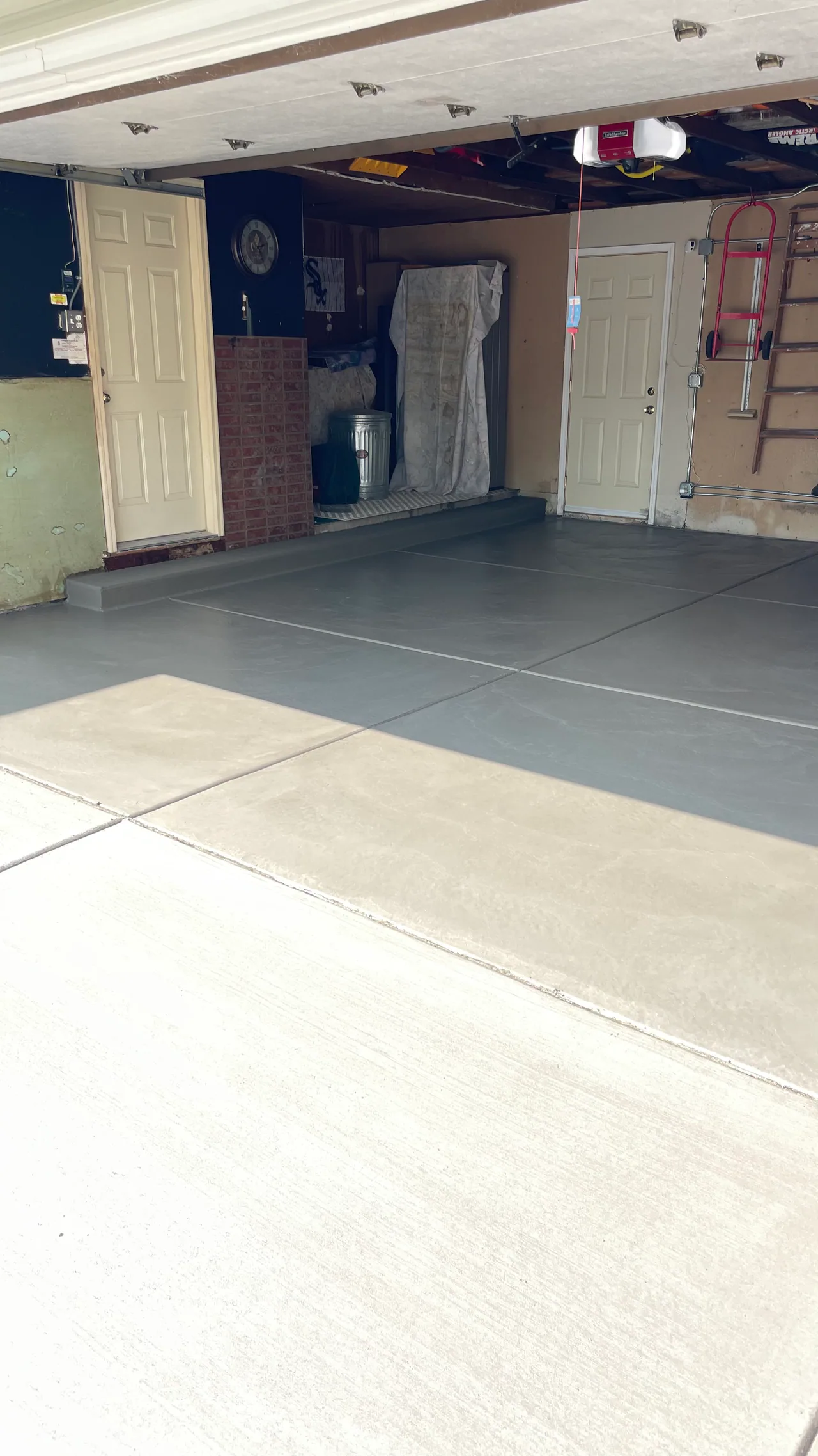 New garage floor with a glossy sealed finish